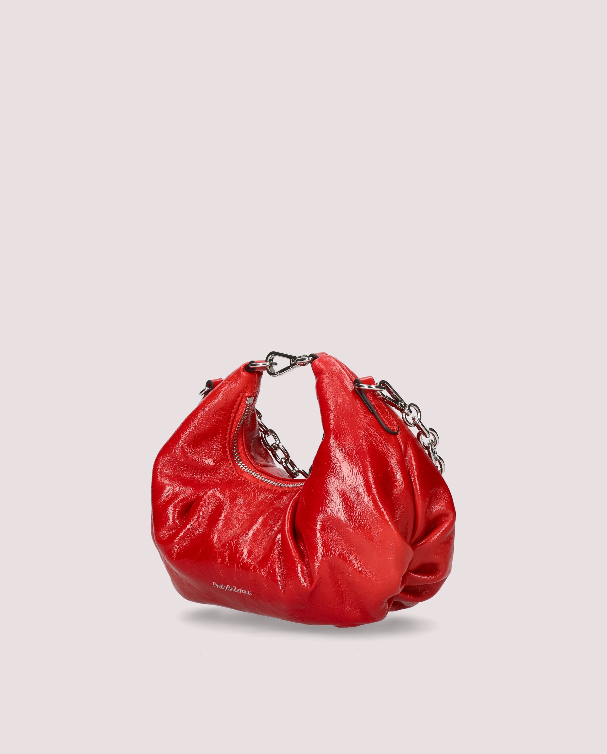 Rote Lackhandtaschen