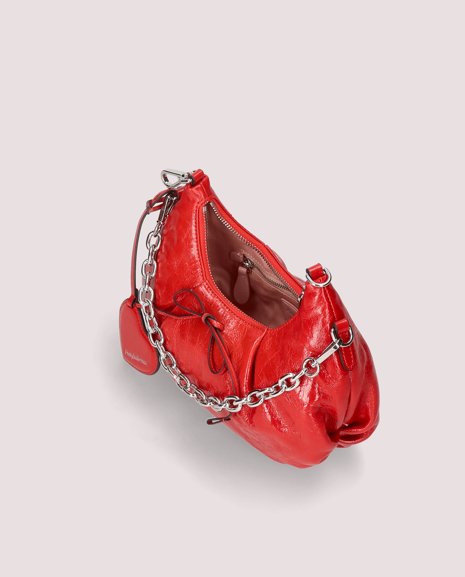 Rote Lackhandtaschen